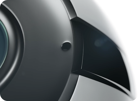 Compact smart home hub with integrated sensors and camera optics